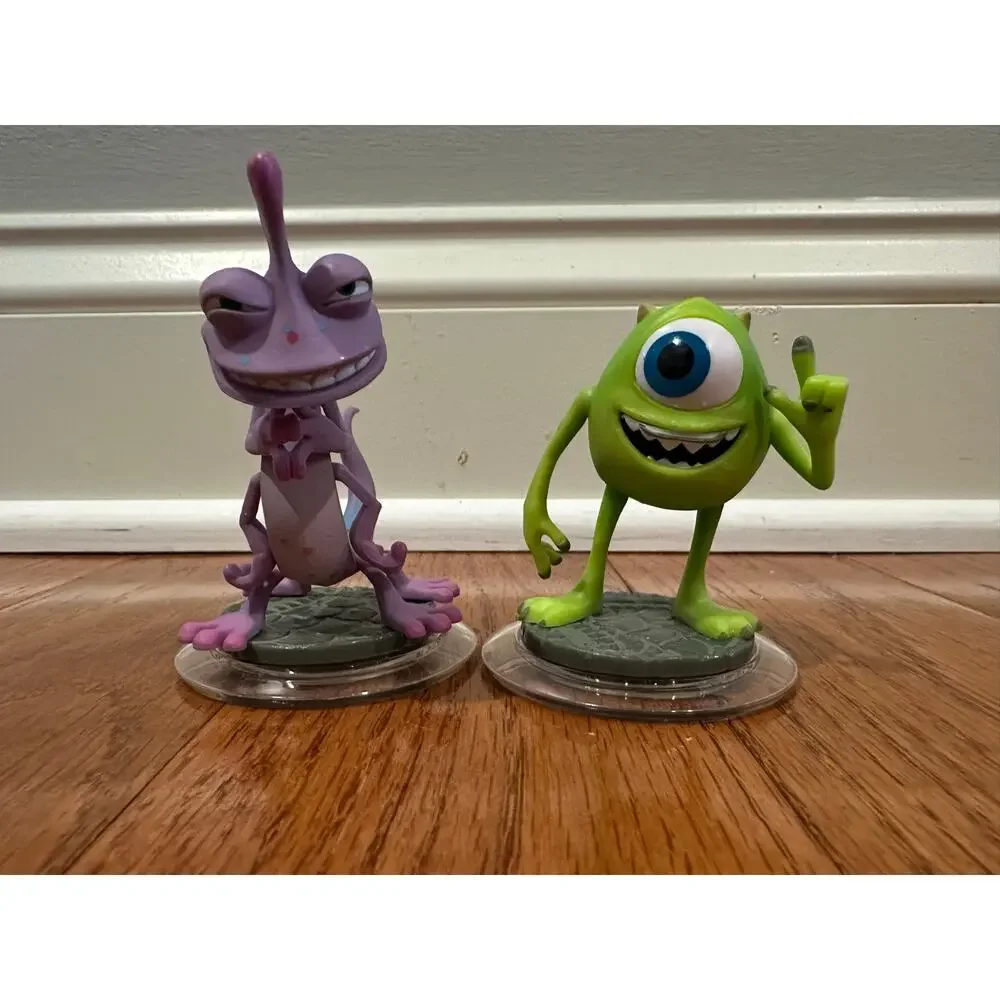 Disney Infinity figures Jack Sparrow, Monsters Inc, and Wreck it Ralph
